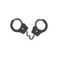 Metal handcuffs for detaining criminals. Outfit of a policeman