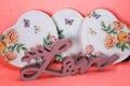 metal heart art hangings with decoupage flowers, pinkish purple love sign