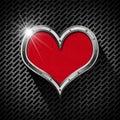 Metal Heart on a Dark Grid Royalty Free Stock Photo