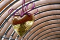 Metal heart used as decor reflects life and light