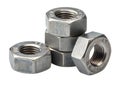 Metal hex nuts pile isolated on white background Royalty Free Stock Photo