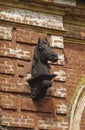 Metal horse head on the facade of a abandoned horse factory of the 19th century