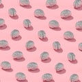 Metal human brains on pink background