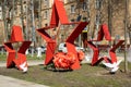 A metal installation of three red stars, carnations and pigeons for the Victory Day May 9 in Russia Royalty Free Stock Photo