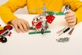 Metal or iron children construction kit with screws, bolts, nuts, screw driver and wrench Royalty Free Stock Photo