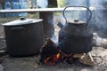 Metal kettle boiling on the fire