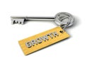 Metal Key with Growth golden tag isolated on white. Key to Growth concept. 3d illustration Royalty Free Stock Photo
