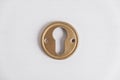 Metal keyhole on a white background. Top view. Copy, empty space for text Royalty Free Stock Photo