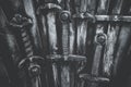 Metal knight swords background. Close up. Royalty Free Stock Photo