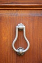 Metal knocker on wooden door Royalty Free Stock Photo