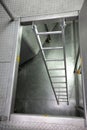 Metal ladder in industrial space