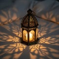 Metal lantern with intricate patterns, casting delicate shadows Royalty Free Stock Photo
