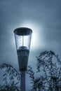 Metal light pole on a cloudy day in Morarilor Park Royalty Free Stock Photo