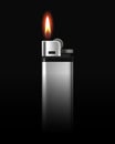 Metal Lighter with Flame on Black Background Royalty Free Stock Photo