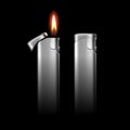 Metal Lighters with Flame on Black Background Royalty Free Stock Photo