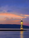 Metal lighthouse at multicolored dramatic sunset, Lake Geneva, Switzerland Royalty Free Stock Photo