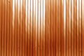 Metal list wall texture of fence in orange color Royalty Free Stock Photo