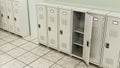 Metal locker storage cabinets for school, fitness club or gym in a row. 3D illustration
