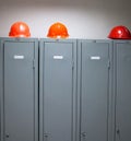 Metal lockers and plastic hard hats