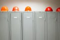 Metal lockers and plastic hard hats