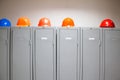 Metal lockers and plastic hard hats