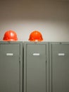 Metal lockers and plastic hard hats