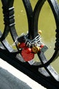 Love locks at a chain in a bridge above a river