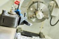 Metal machining process on turning lathe Royalty Free Stock Photo