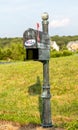 USPS metal mailboxes for rural homes with I voted sticker for vote by mail