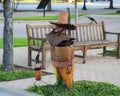 Metal man sculpture in front of the historic Vandergriff Office Building in Arlington, Texas.