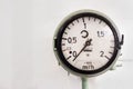 Metal Manometer, Round Industrial Thermometer Black Big Digits A Dial On Zero White Background