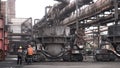 Metal melting vats being transported on big carts to the metal melting shop, heavy industry concept. Stock footage.Two