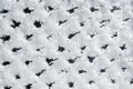 Metal mesh fence, covered with fluffy frost in the winter morning_ Royalty Free Stock Photo