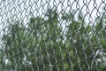 Metal mesh netting close-up. Rabitz. Close up. background. Abstraction. Mesh netting in perspective on a green background as a