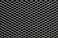 Metal mesh plating isolated against a black background Royalty Free Stock Photo