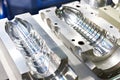 Metal molds for plastic bottles Royalty Free Stock Photo