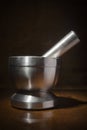 Metal mortar with pestle Royalty Free Stock Photo