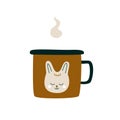 Metal mug with the image of a head bunny with a hot drink. A porcelain cup with tea or coffee with smoke or steam