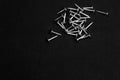 Metal nails isolated on black background. working tools Royalty Free Stock Photo