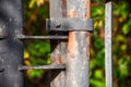 Metal old pipe with a clamp with a bolt Royalty Free Stock Photo