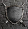 Metal old shield with crossed swords on brick wall 3d illustration