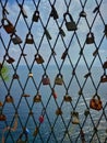 Metal padlock fence gate with the blue sea in the background in Dubrovnik, Croatia Royalty Free Stock Photo