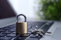 Metal padlock and keys on laptop keyboard, space for text. Cyber security concept Royalty Free Stock Photo