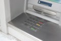 Metal panel of ATM with keyboard for code pin entry with inscriptions in English and Ukrainian Royalty Free Stock Photo