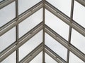 The metal parts of the glass roof form a triangular structure Royalty Free Stock Photo