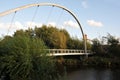 Metal pedestrian footbridge crossing the river aire in leeds Royalty Free Stock Photo