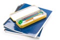 Metal pencil case and book Royalty Free Stock Photo