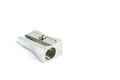 A metal pencil sharpener on a white background Royalty Free Stock Photo