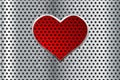 Metal perforated background with red heart Royalty Free Stock Photo