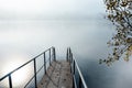 Calm water on a lake with small pier Royalty Free Stock Photo